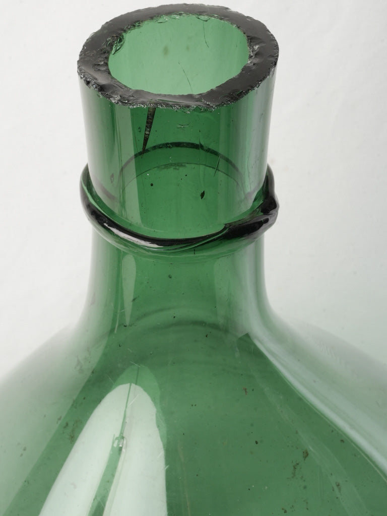 Textured early 20th century carboy