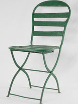 Set of seven antique French folding garden chairs - green