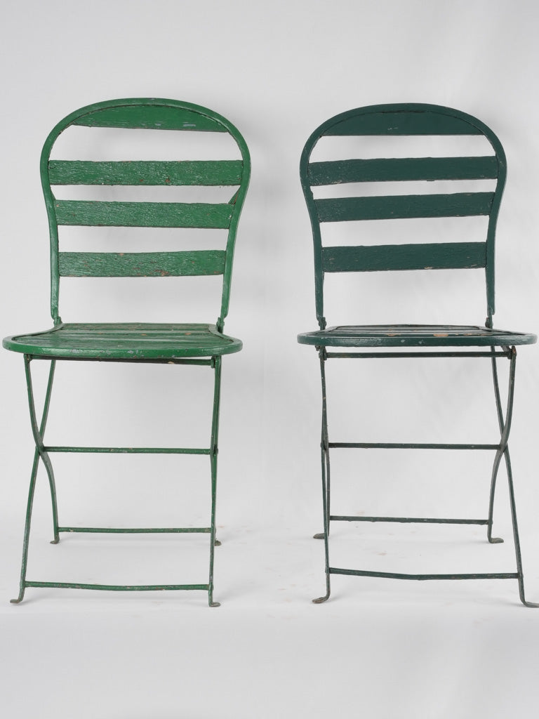 Set of seven antique French folding garden chairs - green
