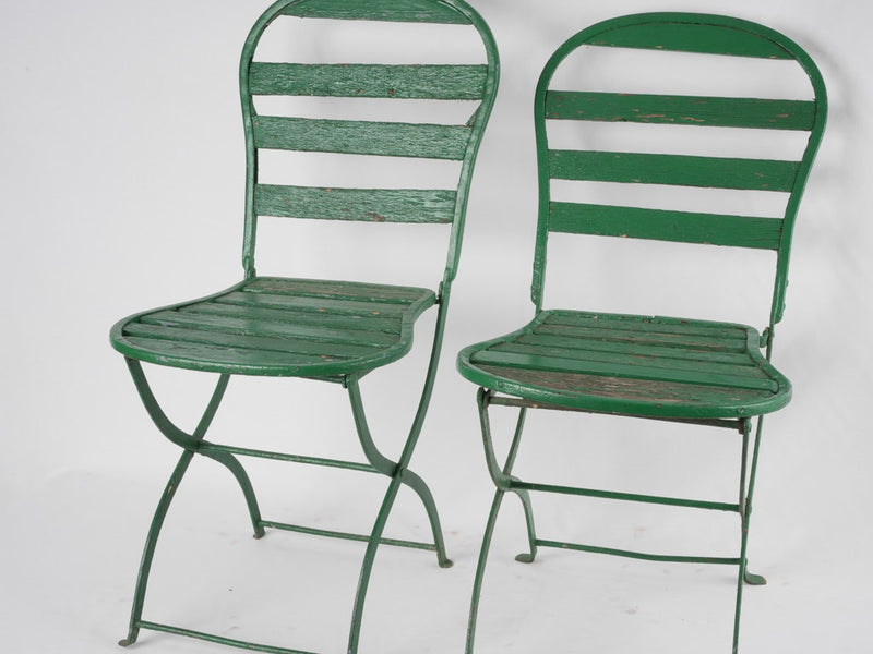 Set of seven antique French folding garden chairs - green