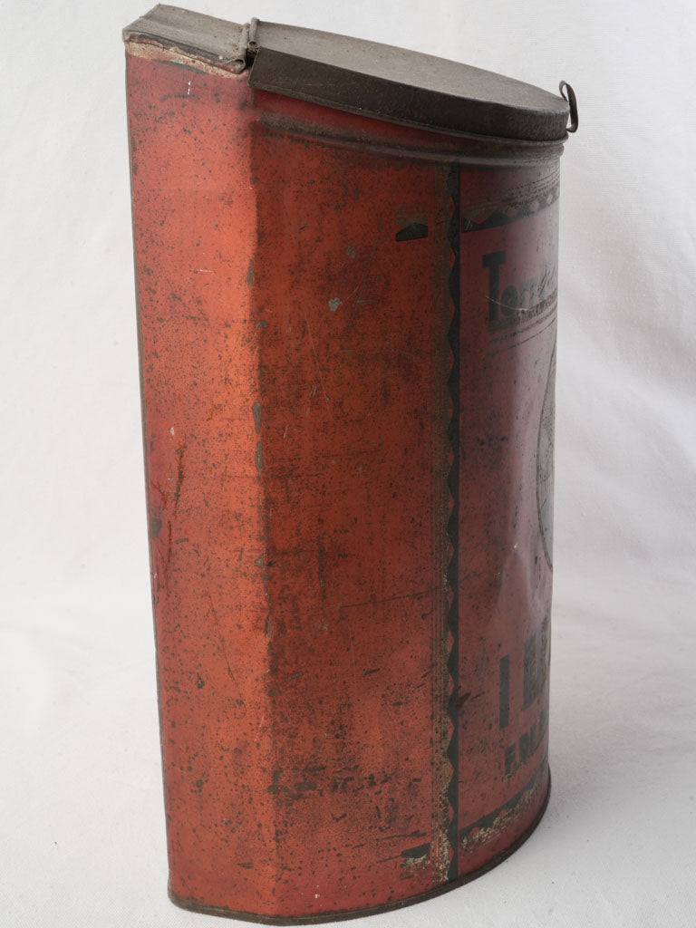 Richly decorated antique tin container