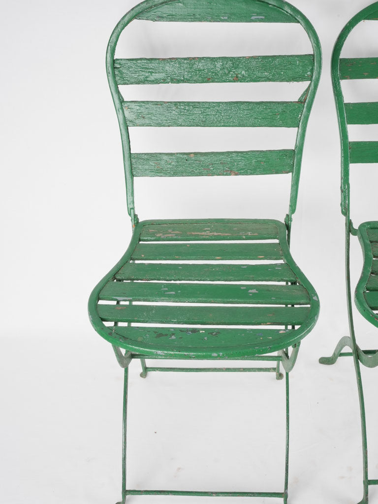 Set of seven antique French folding garden chairs - green