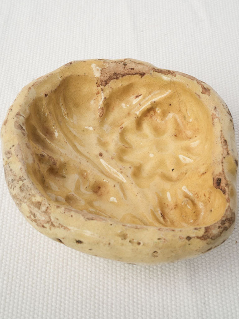 Artisanal yellow glazed mold