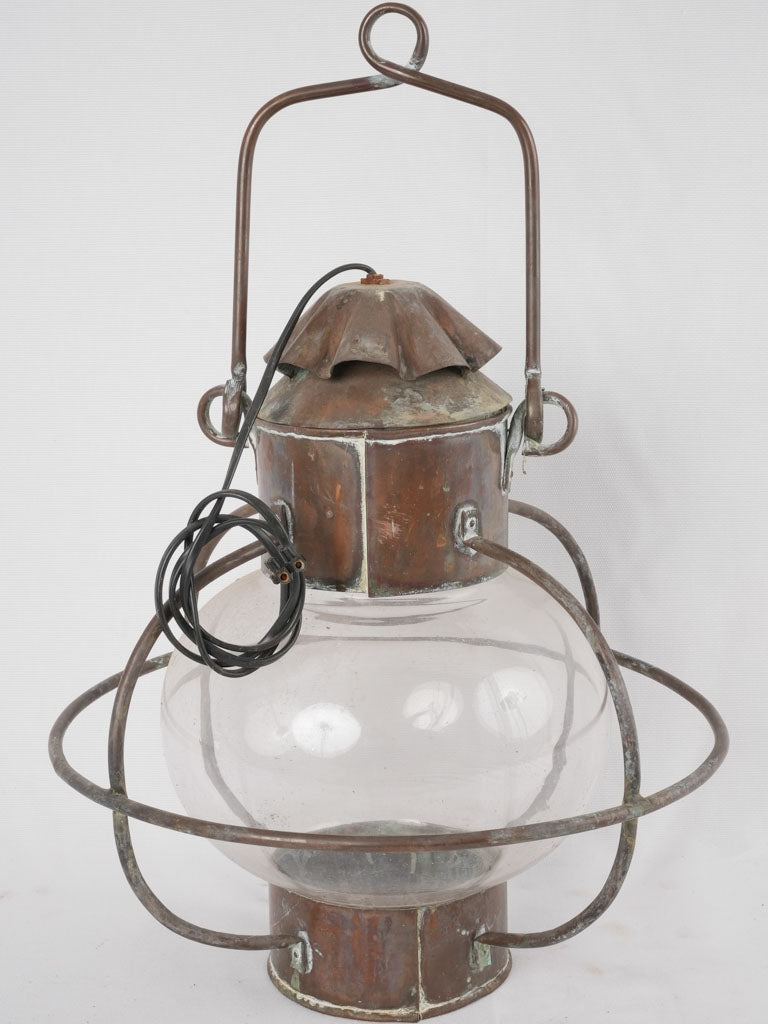 Weathered copper maritime navigation lamp