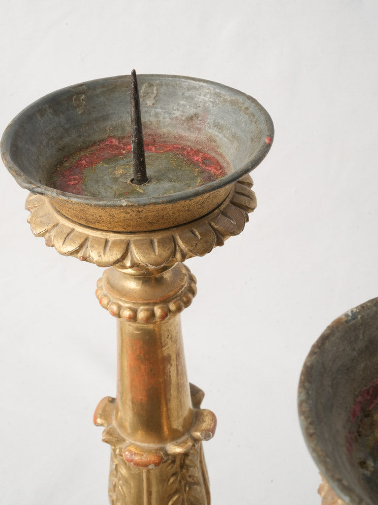 Luminous gilded altar candlesticks  