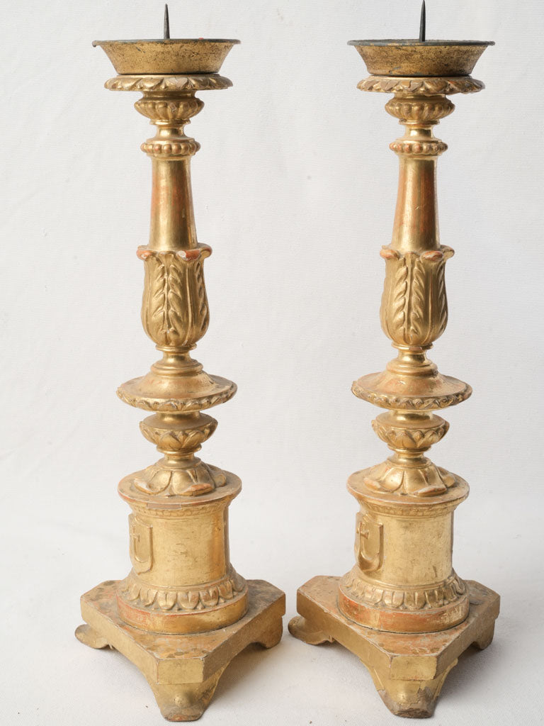 Symmetrical giltwood pricket candlesticks  