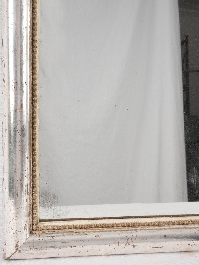 Timeless silver-painted antique bistro mirror