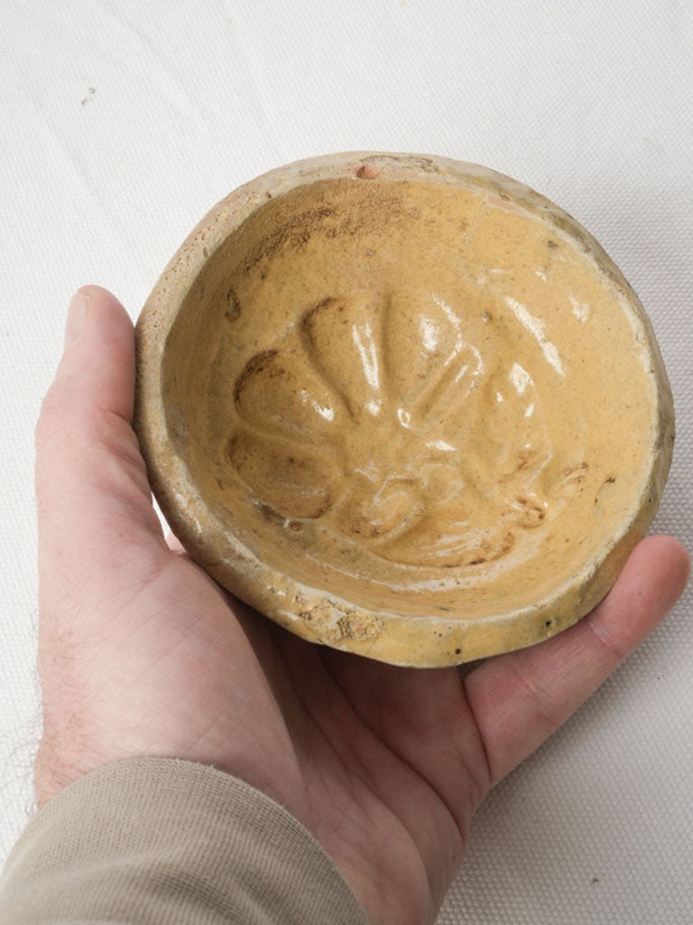 Antique flower-shaped terracotta mold