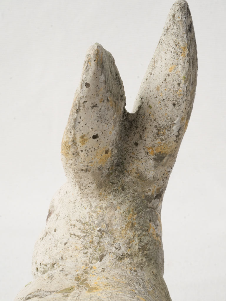 Softly patinaed stone rabbit figurine  
