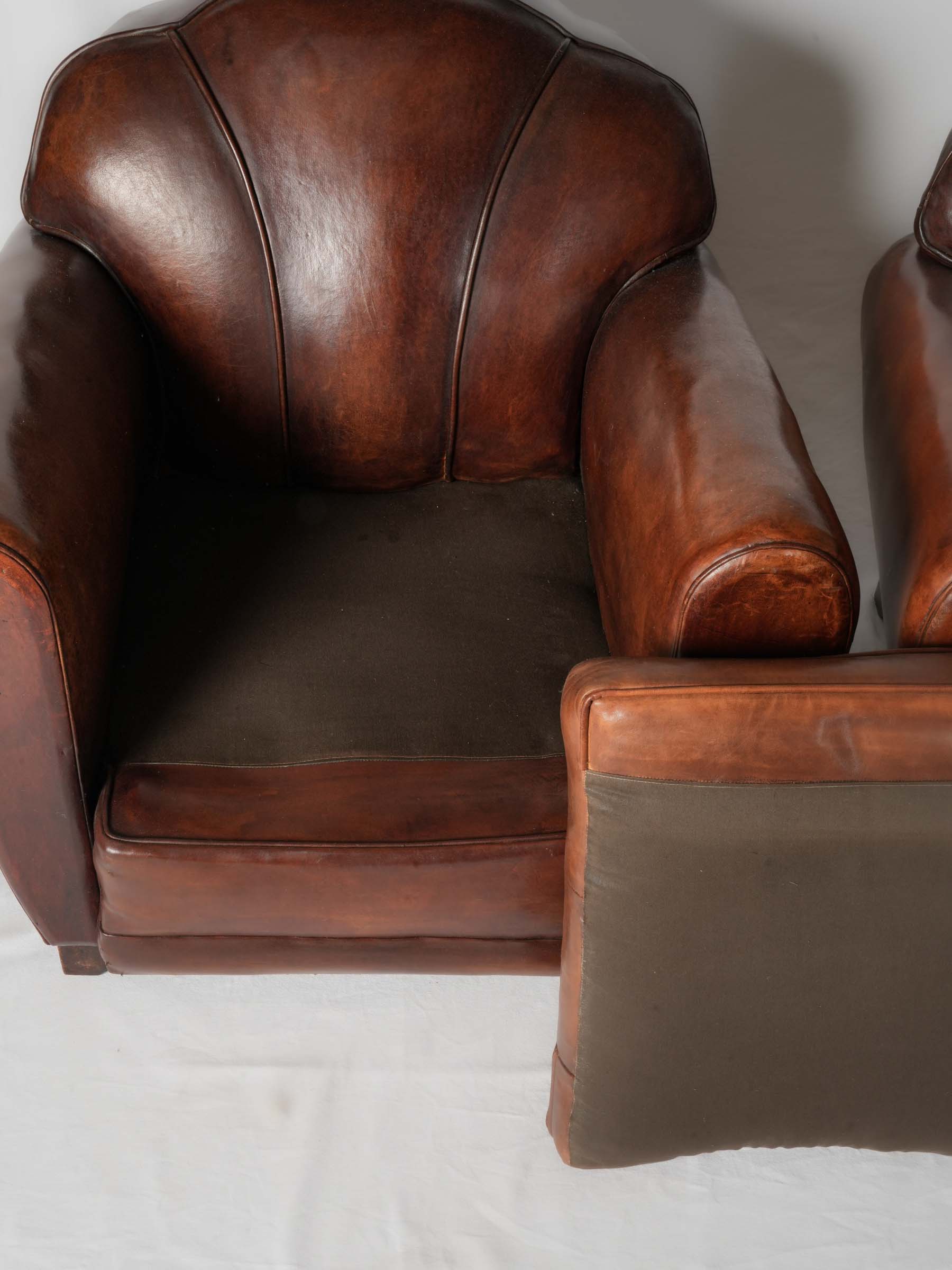 Comfortable restored cloudback leather chairs