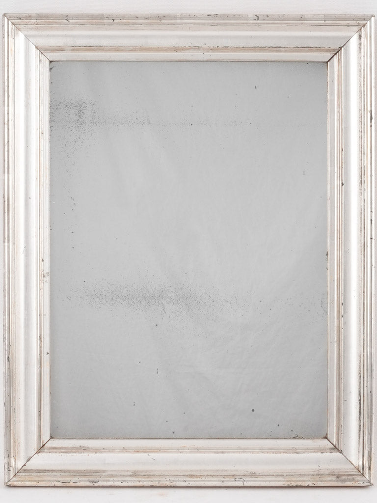 Antique silver-framed French wall mirror