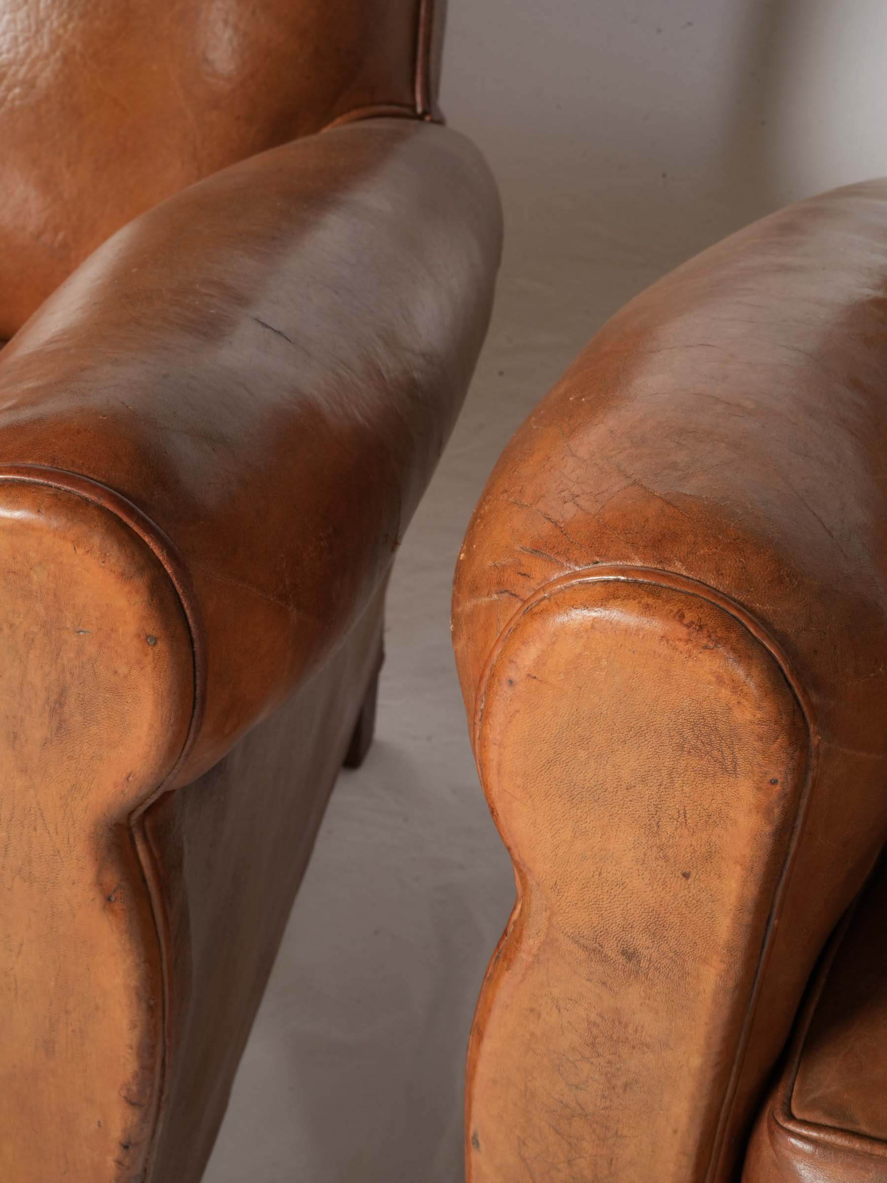 Rustic tobacco-toned club seating  