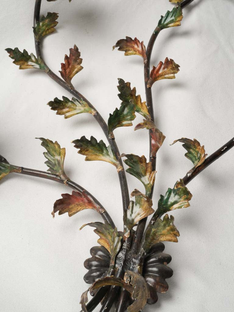 Aged bronzed floral metal sconce  
