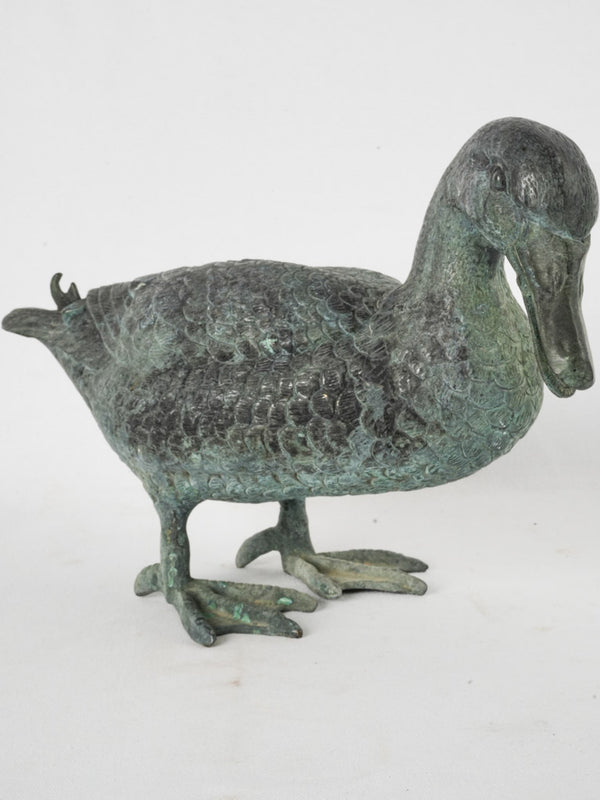 Vintage bronze garden sculpture of a duck 18½"