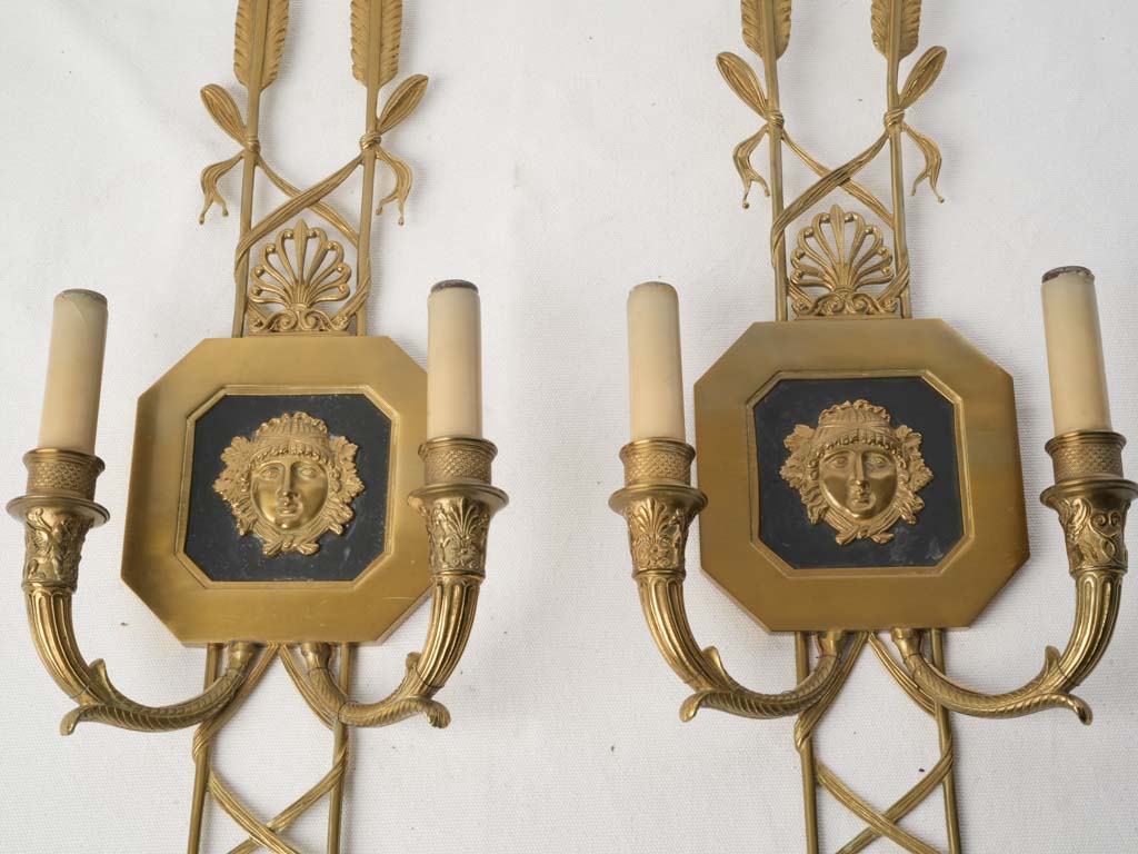 Satin gold finish wall lights