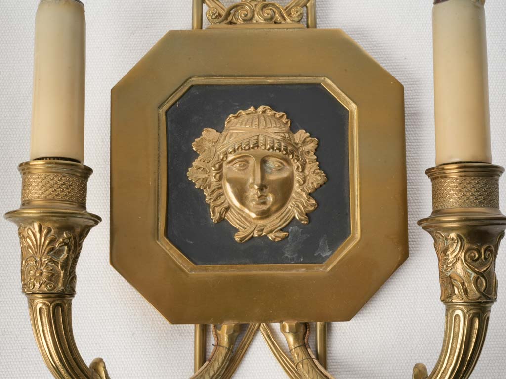 Antique patinated bronze sconces