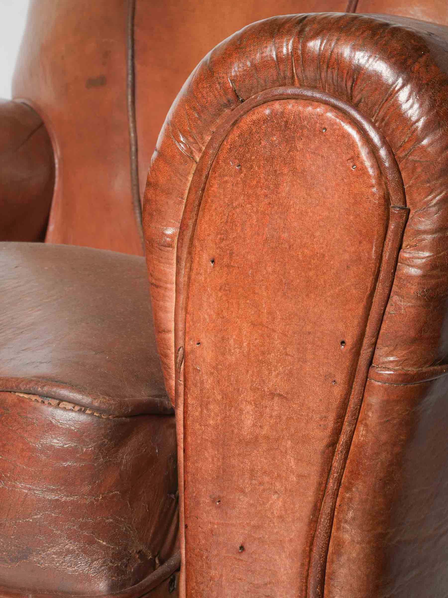 Authentically aged patina club chair