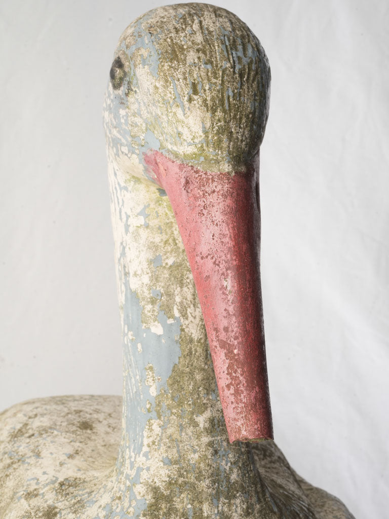 Worn artistic stork collectible piece  