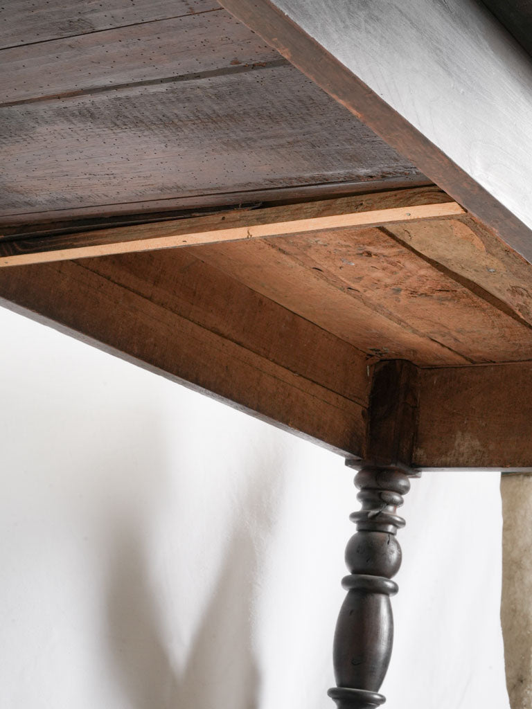 Distinctive patina detailed dining table