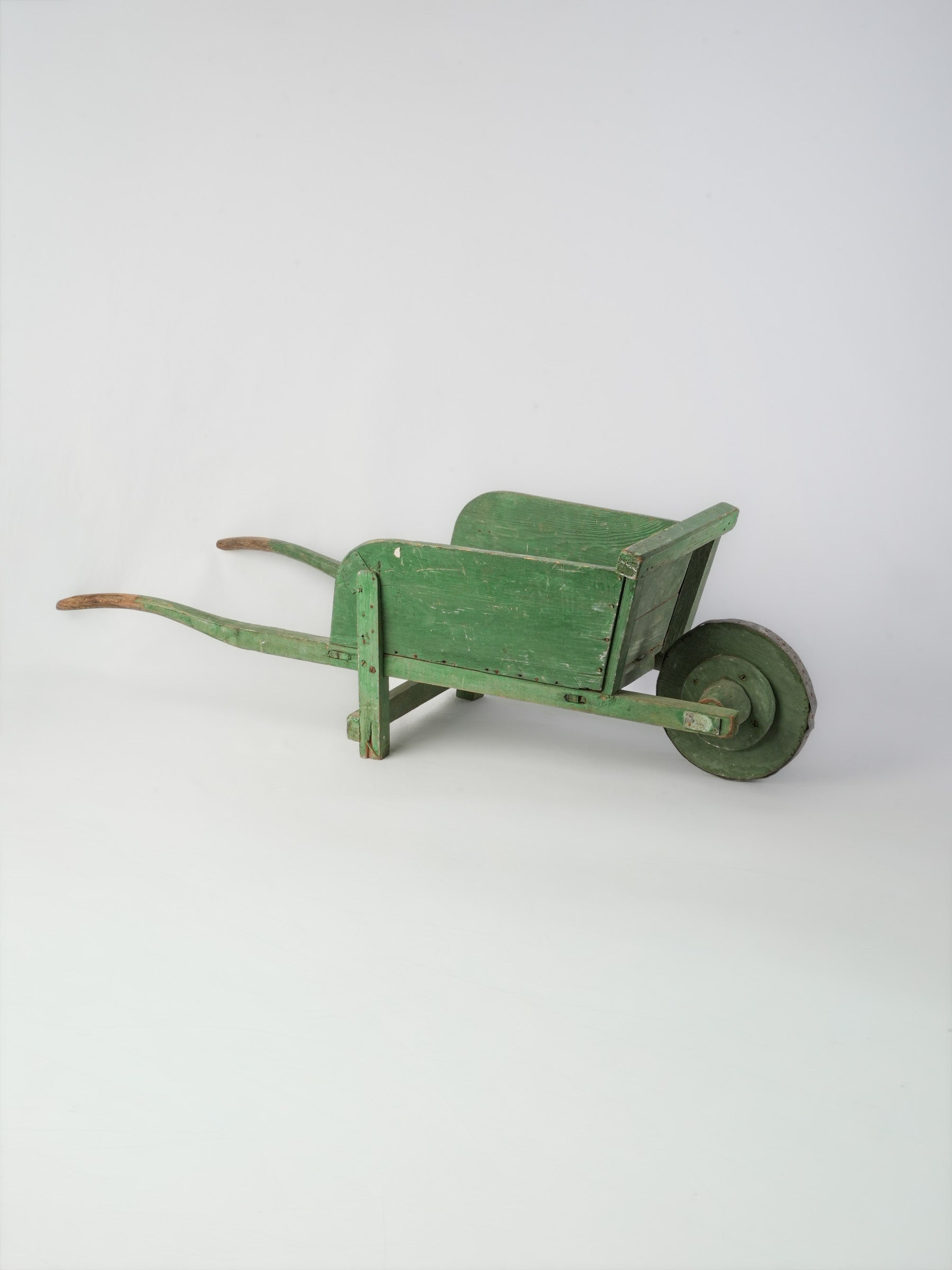 Vintage rustic wooden wheelbarrow
