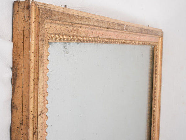 Gold-framed eighteenth-century French mirror