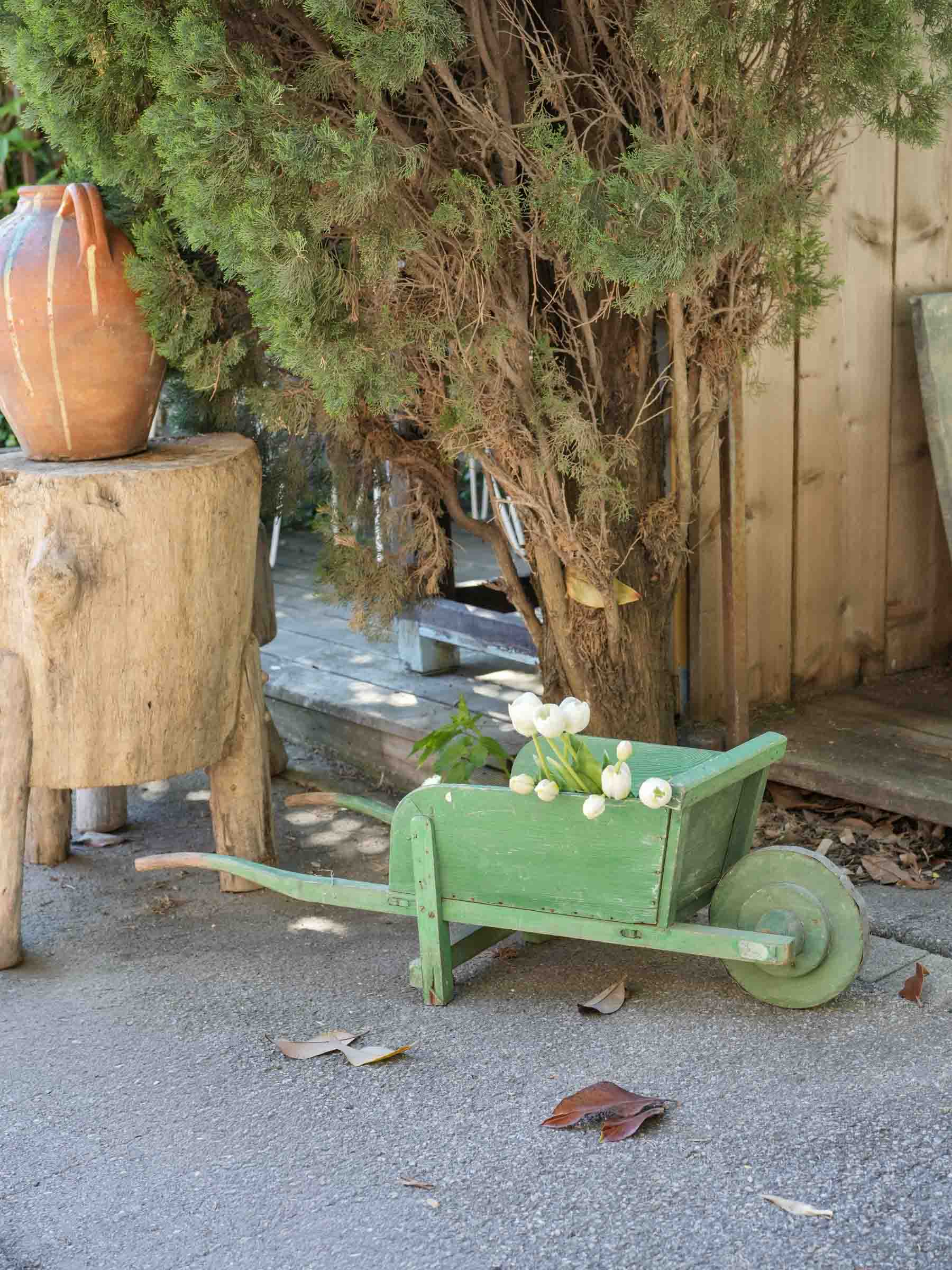 Green-painted antique child’s cart
