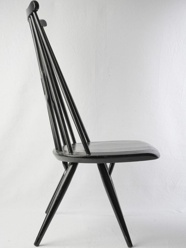 Distinctive pierced paddle back chair  