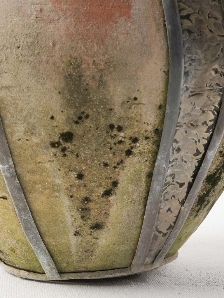 Weathered artisan crafted container  