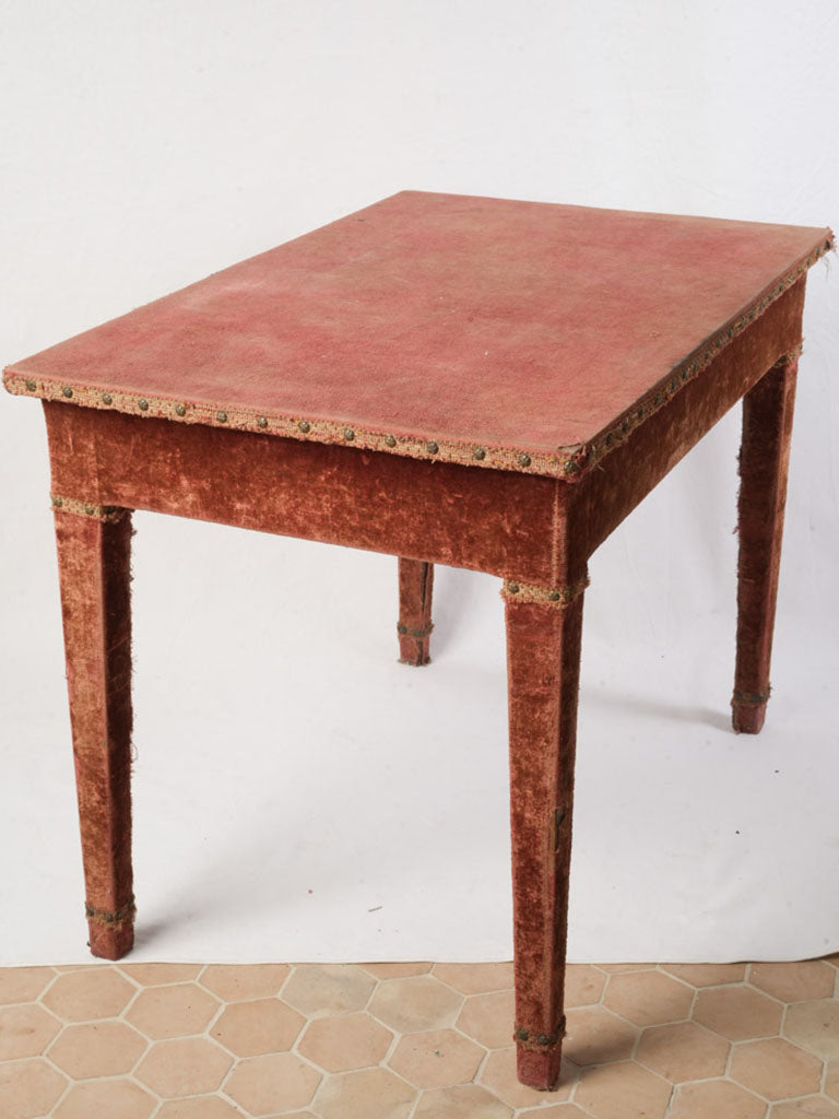 Faded red upholstery vintage table  