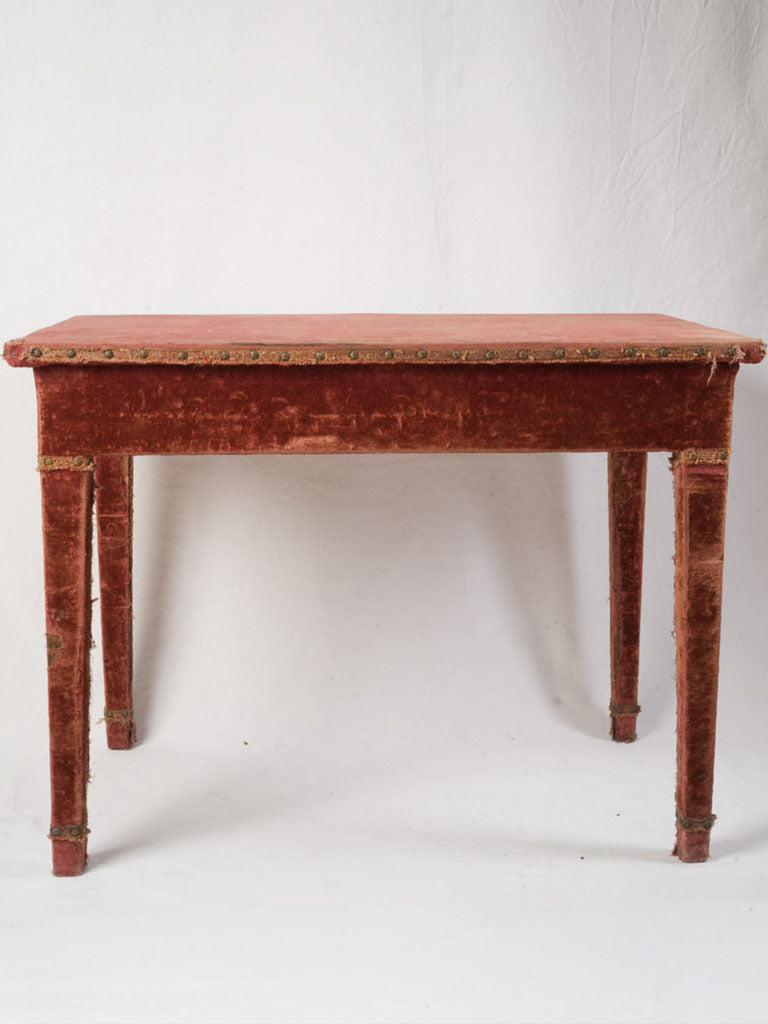 Antique velvet-covered accent table  