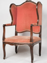 Antique velvety pink French wingback chair