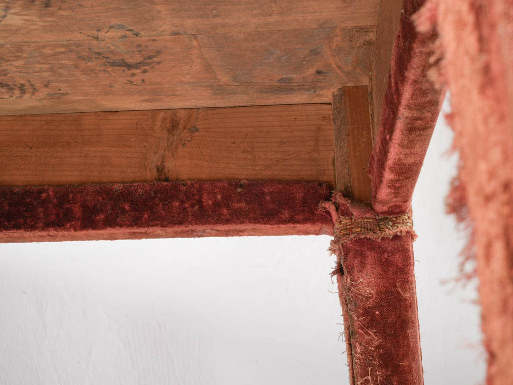 Soft worn velvet-covered table  