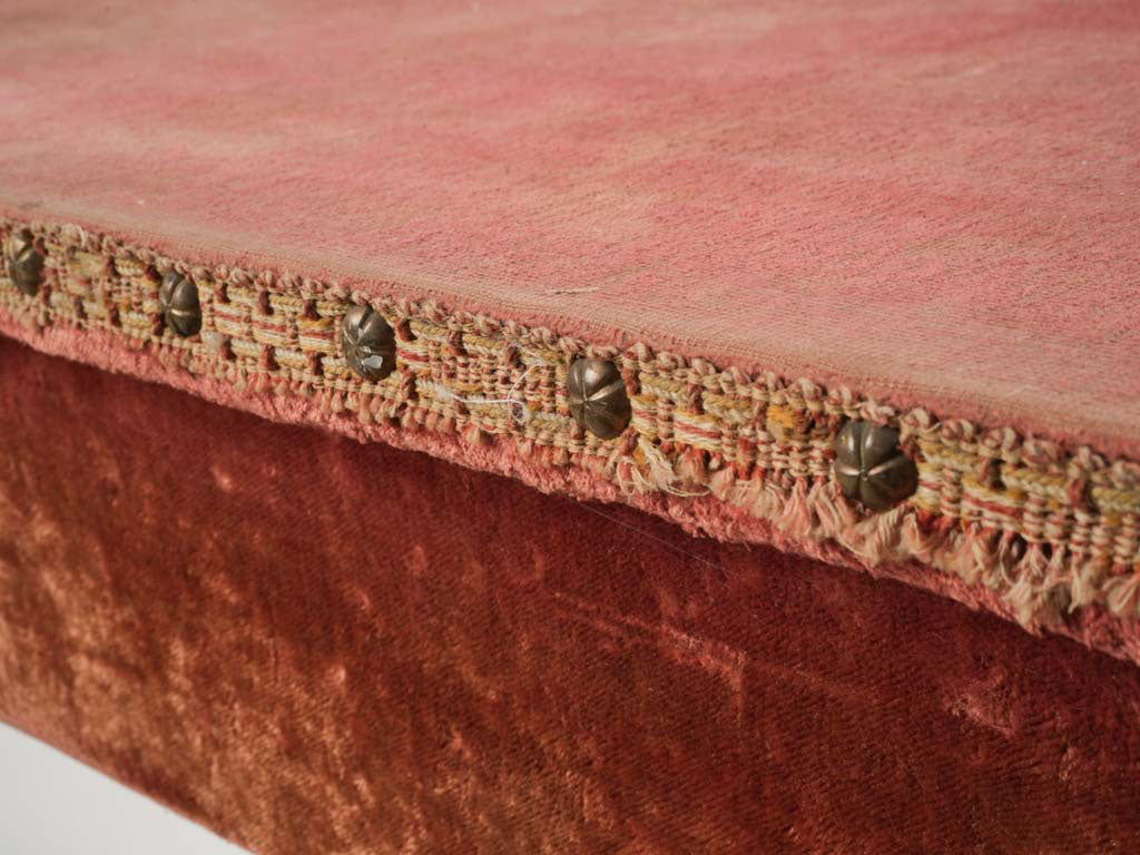 Delicate nailhead-trimmed table  