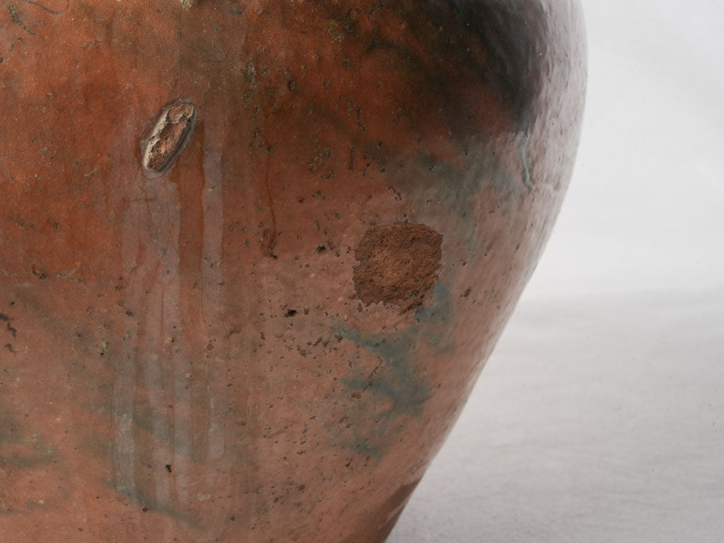 Ornate loop-handled vintage pitcher  