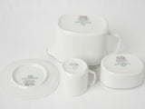 Elegant green and white French teacups