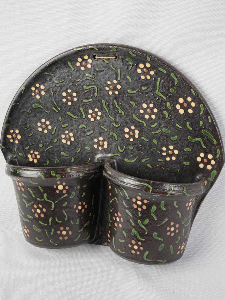 Stylized floral design cutlery holder