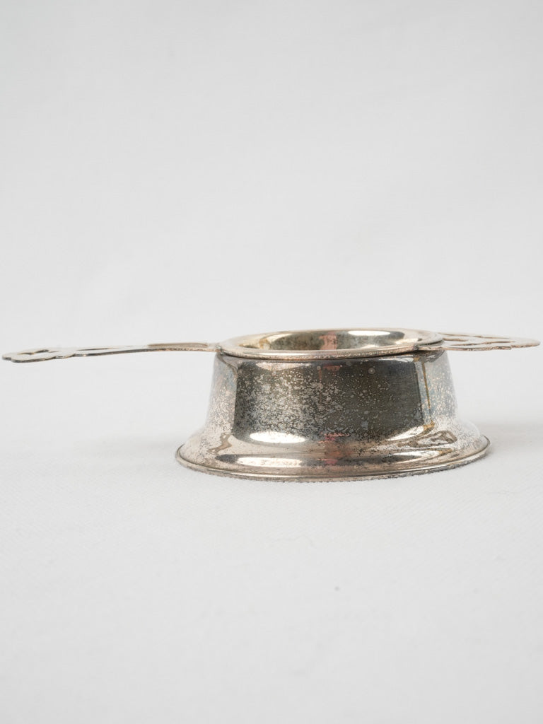 Charming flared base tea strainer