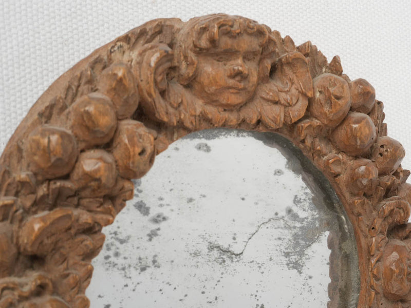 Timeless, carved, cherub-framed, French mirror
