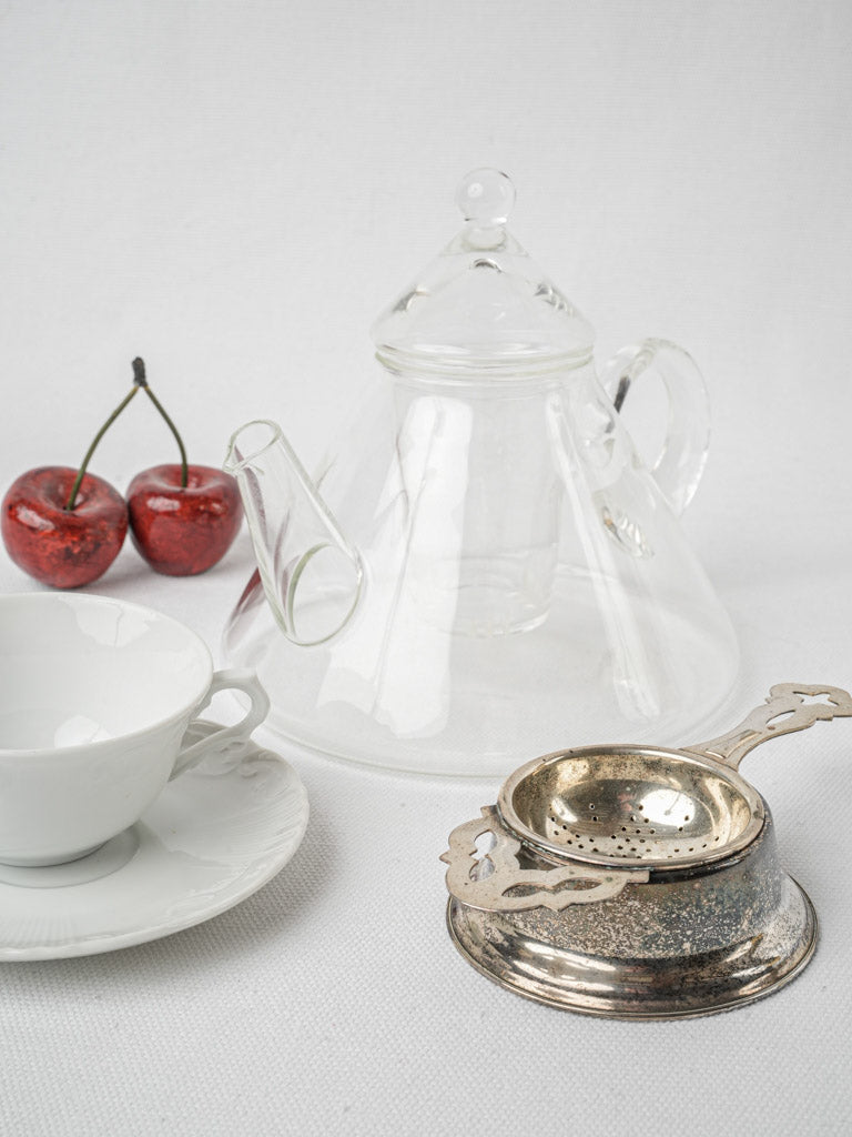 Antique patinated English tea strainer