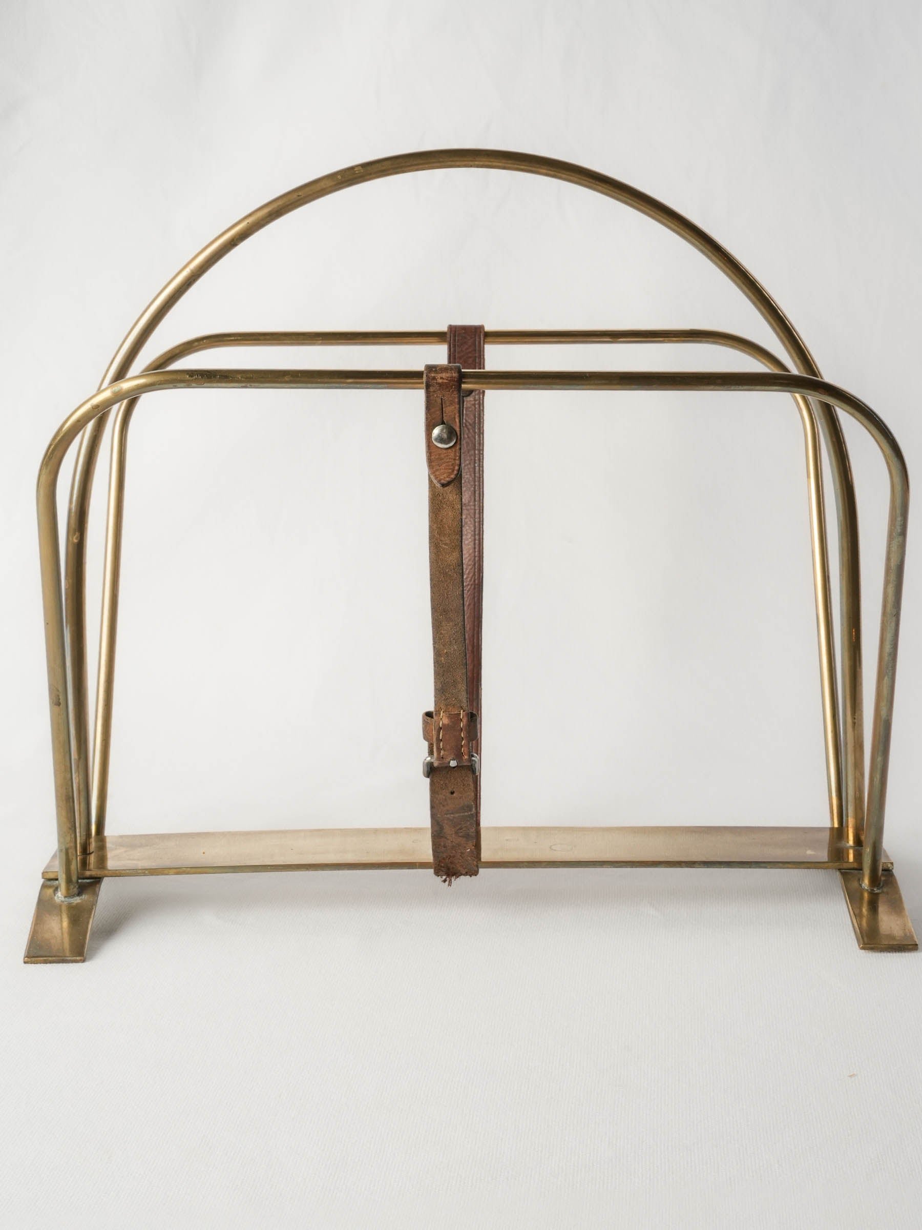 Mid-Century Hollywood Regency Brass Magazine Rack with Buckled Leather Strap - 16½" x 17¾"