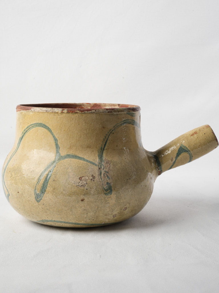 Decorative bulbous-handled saucepan