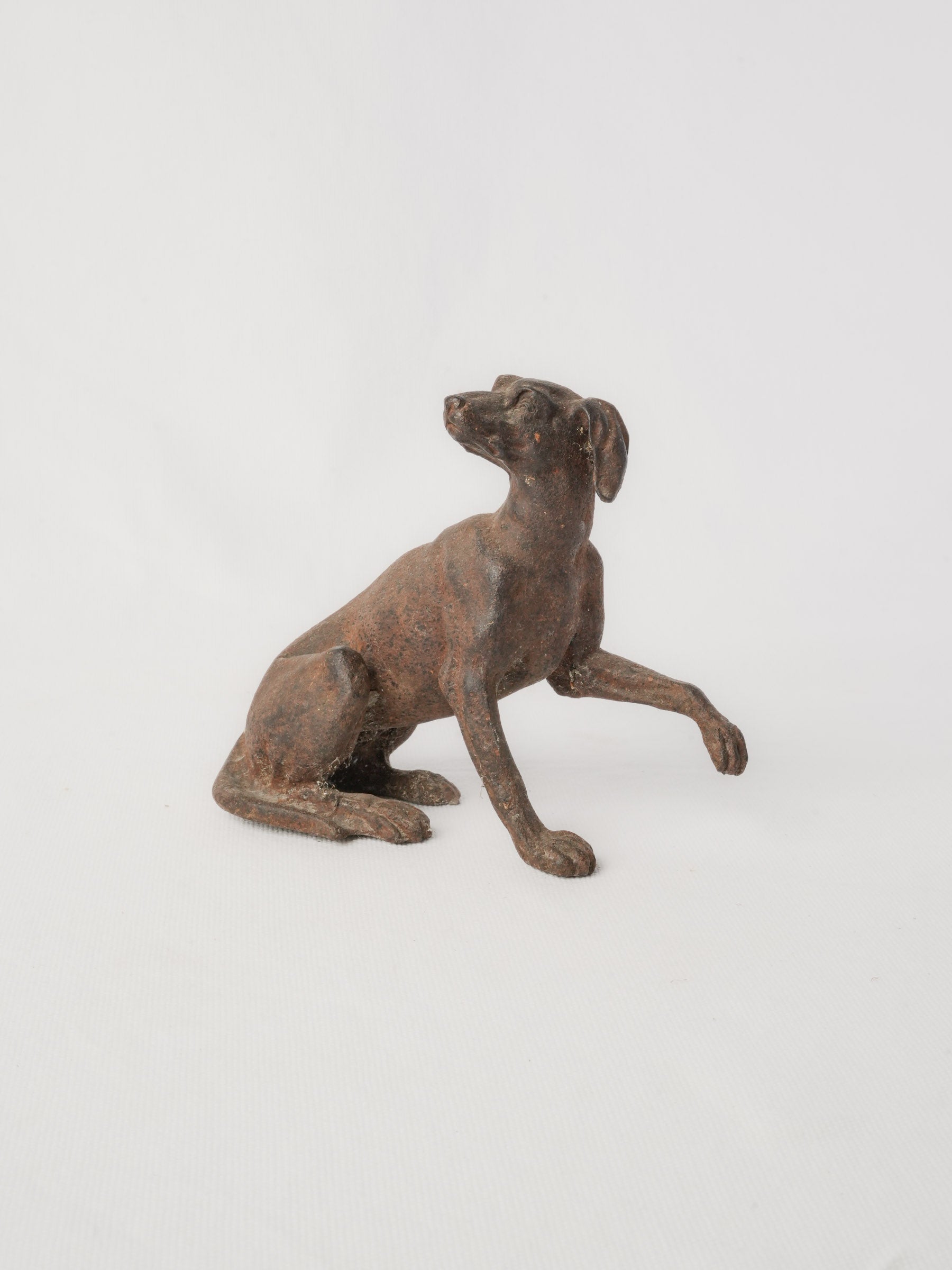 Rustic weathered dog sculpture