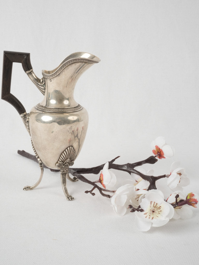 Antique lion's paw handled creamer