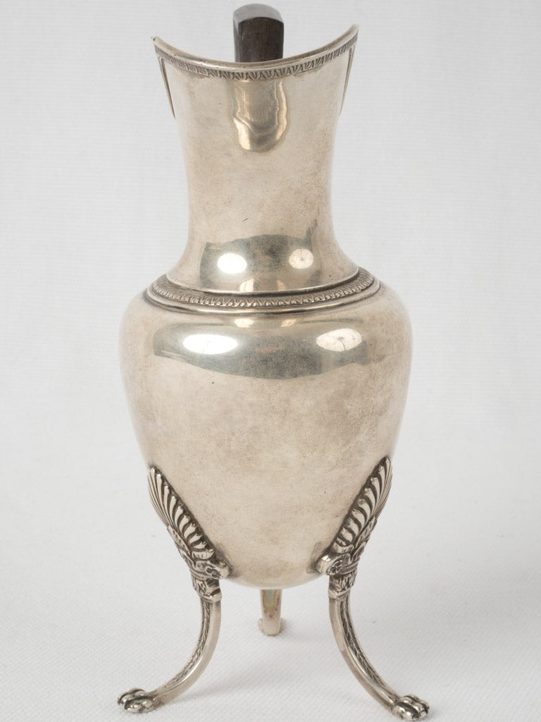 Refined French Empire-style silver creamer