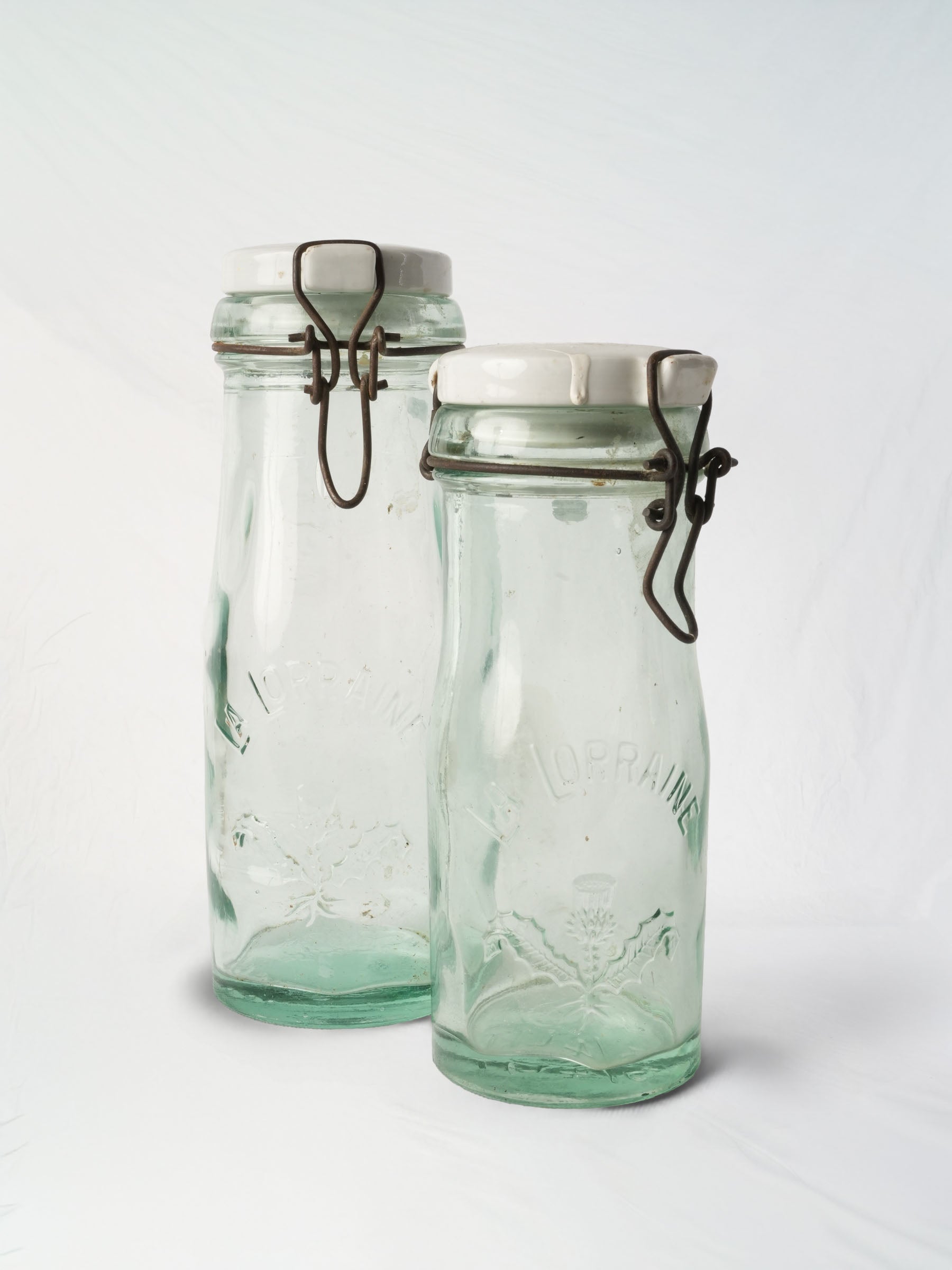 Graduated Pair of French "La Lorraine" Embossed Glass Preserving Bottles, 1930s–1950s - 10¾"