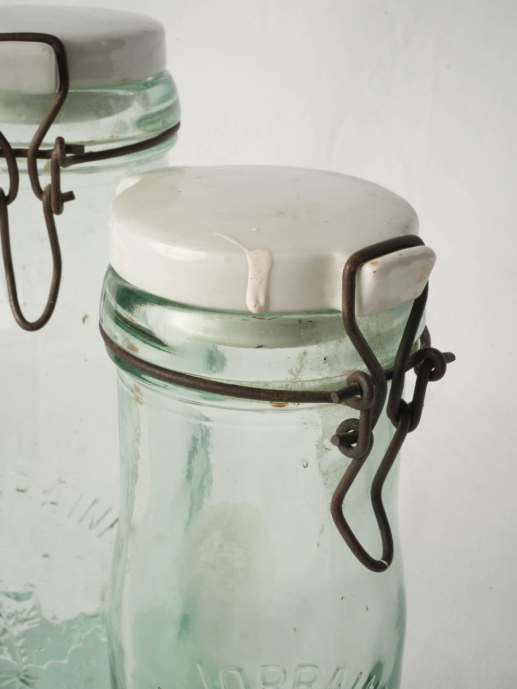 Graduated Pair of French "La Lorraine" Embossed Glass Preserving Bottles, 1930s–1950s - 10¾"