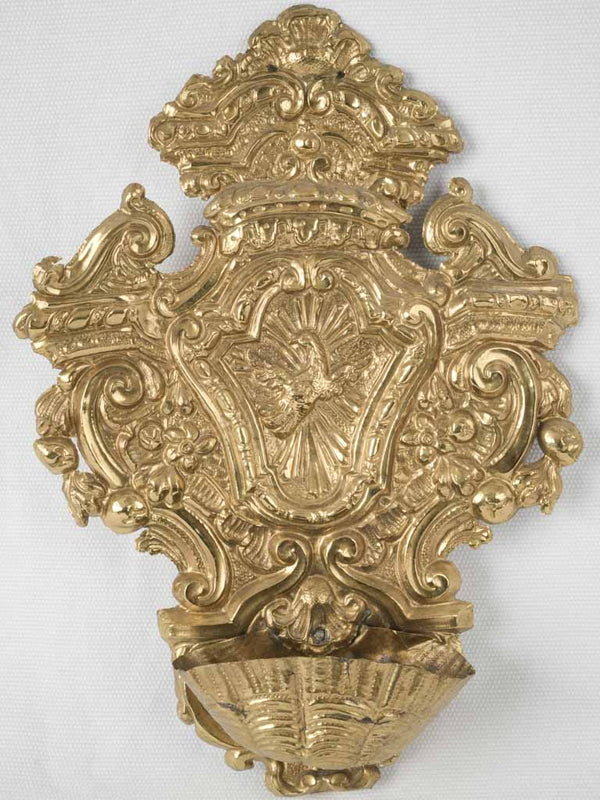 Antique gilded Bénitier with religious symbolism 