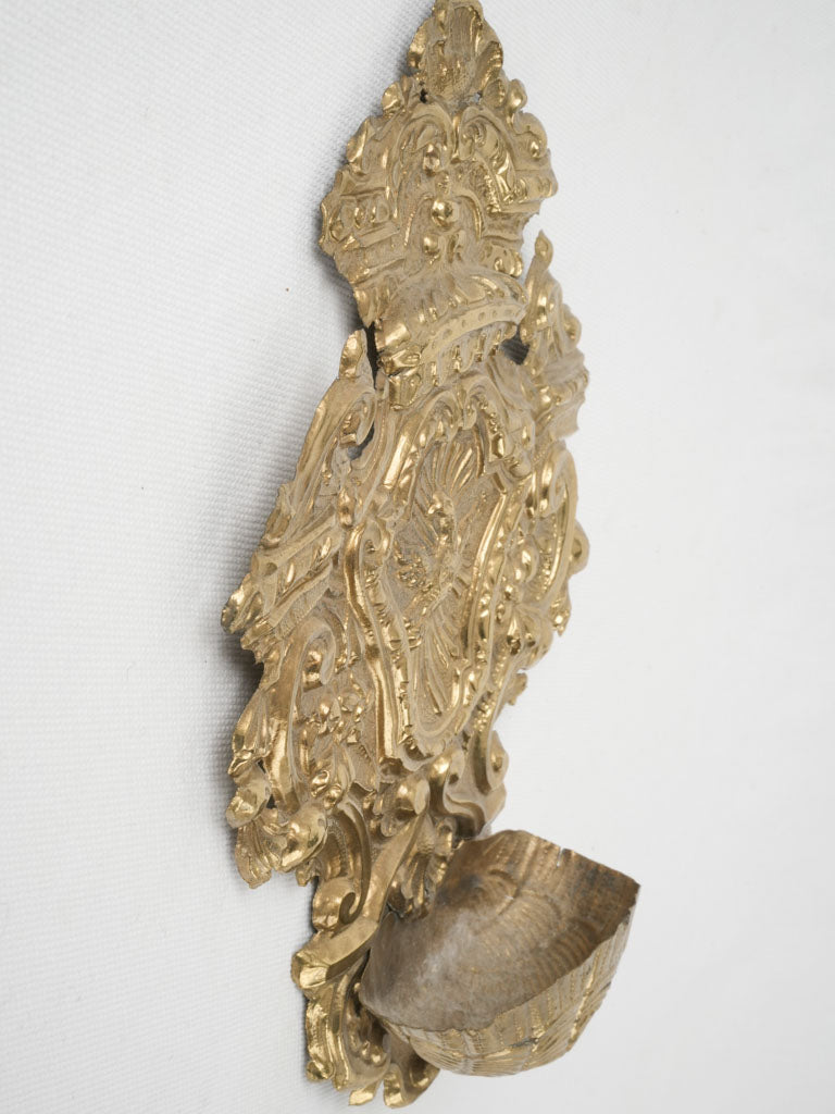 Reverent antique Bénitier with artisan craft 