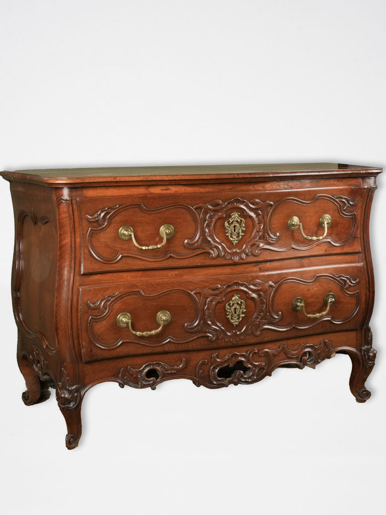 Authentic rocaille-decorated walnut commode