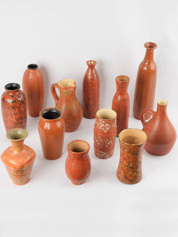Collection of 12 red ocher vases & pitchers 7" - 17"